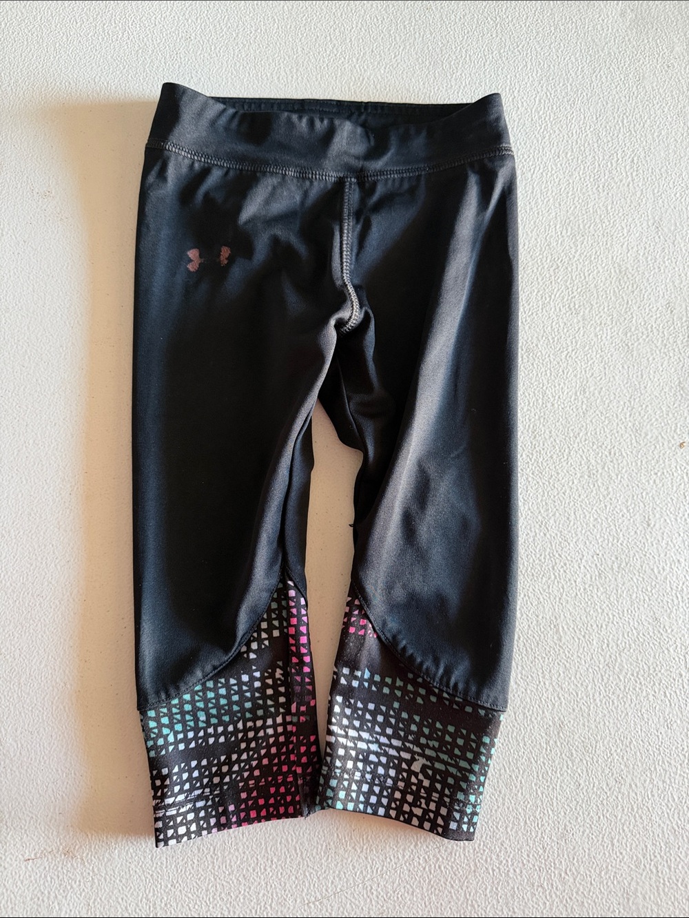 Under Armour Black Capri Leggings with Multicolor Geometric Hem